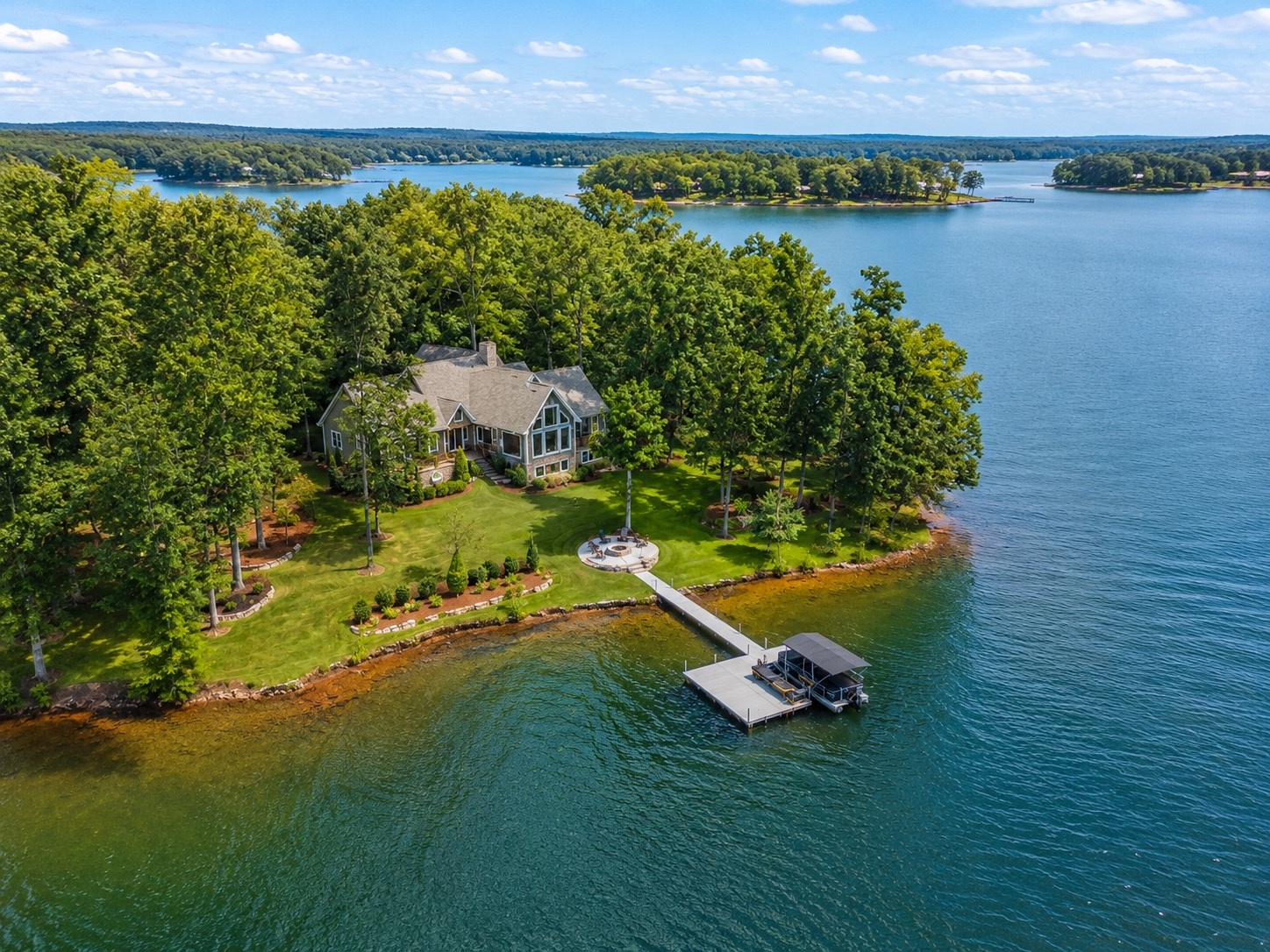 FAA-licensed aerial drone photograph of a lakefront property